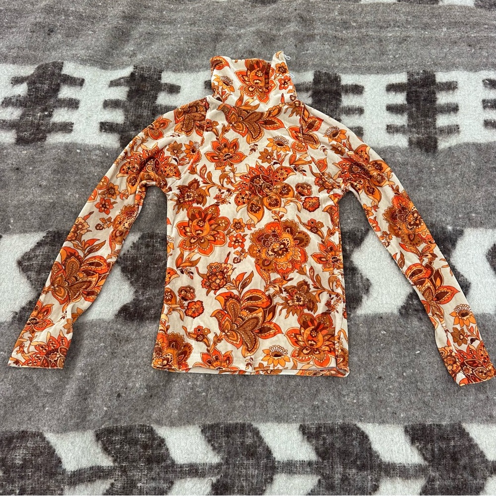 Dodo Bar Or Brenda Turtleneck in vibrant Orange and Cream